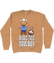 Load image into Gallery viewer, A gay cowboy wearing checked shirt, jeans, chaps and a cowboy hat standing next to a naked man hog tied with red rope.
