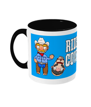 Load image into Gallery viewer, A gay cowboy wearing checked shirt, jeans, chaps and a cowboy hat standing next to a naked man hog tied with red rope.
