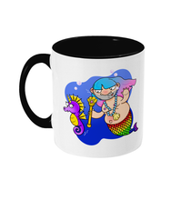 Load image into Gallery viewer, A non binary merperson with gay pride coloured fin and trans pride coloured hair chasing a non binary pride coloured sea horse
