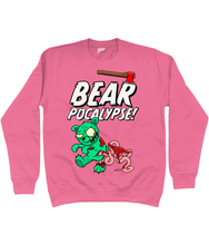 Load image into Gallery viewer, Pink sweatshirt with white bold text reading Bearpocalypse! with an axe embedded in it and a green zombie bear infront of it with its intestines hanging out.
