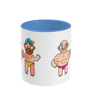 Load image into Gallery viewer, Gay bearded couple in their swimming speedos, one of who is badly sunburnt on a mug
