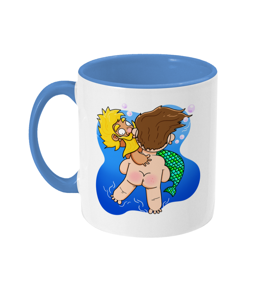 Blond bearded gay mermen being rescued underwater design on a mug