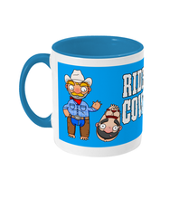 Load image into Gallery viewer, A gay cowboy wearing checked shirt, jeans, chaps and a cowboy hat standing next to a naked man hog tied with red rope.
