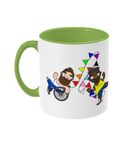 Load image into Gallery viewer, Two disabled gay hunks one in a wheelchair and one an amputee racing whilst celebrating pride.
